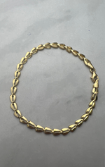 Háromszög szemes fűzött fazonú arany karlánc