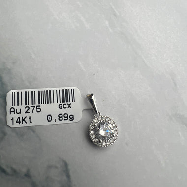 Kerek alakú, karmos foglalatban cirkónia köves fehérarany medál