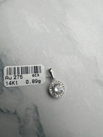 Kerek alakú, karmos foglalatban cirkónia köves fehérarany medál