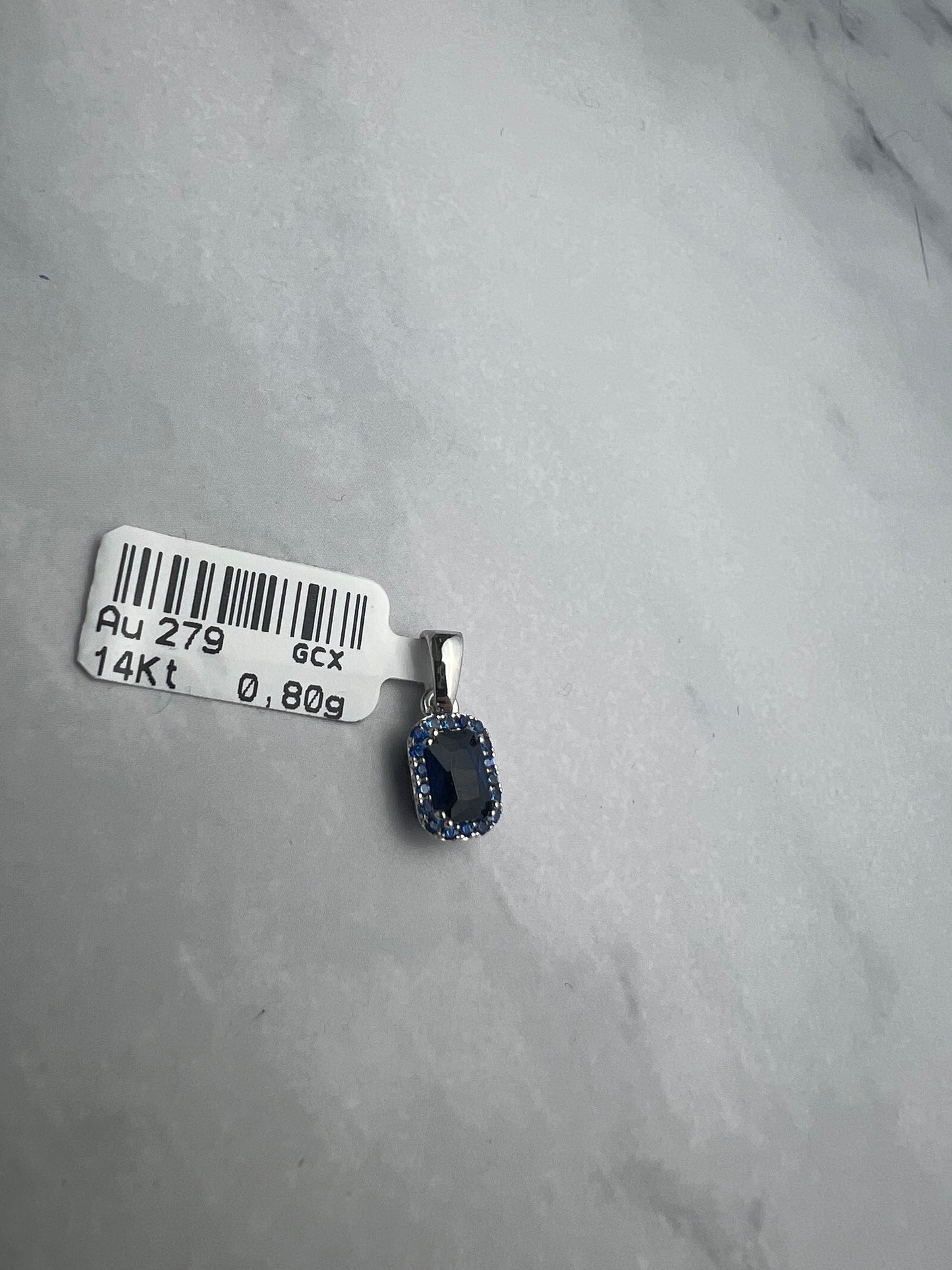 Sötétkék színű, téglalap alakú cirkónia köves fehérarany medál