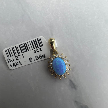 Kék szintetikus opál köves, fehér cirkónia kövekkel díszített arany medál