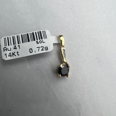 Extravagáns arany medál fekete főkővel és fehér pici kövekkel