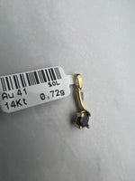 Extravagáns arany medál fekete főkővel és fehér pici kövekkel