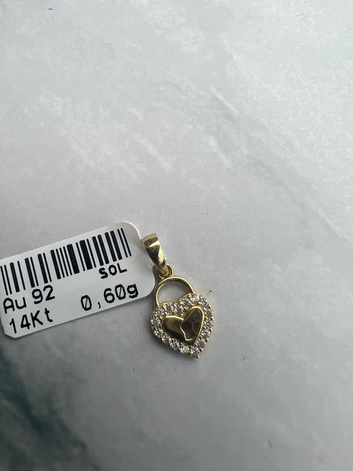 Szív és lakat kombinációjú arany medál cirkónia kövekkel