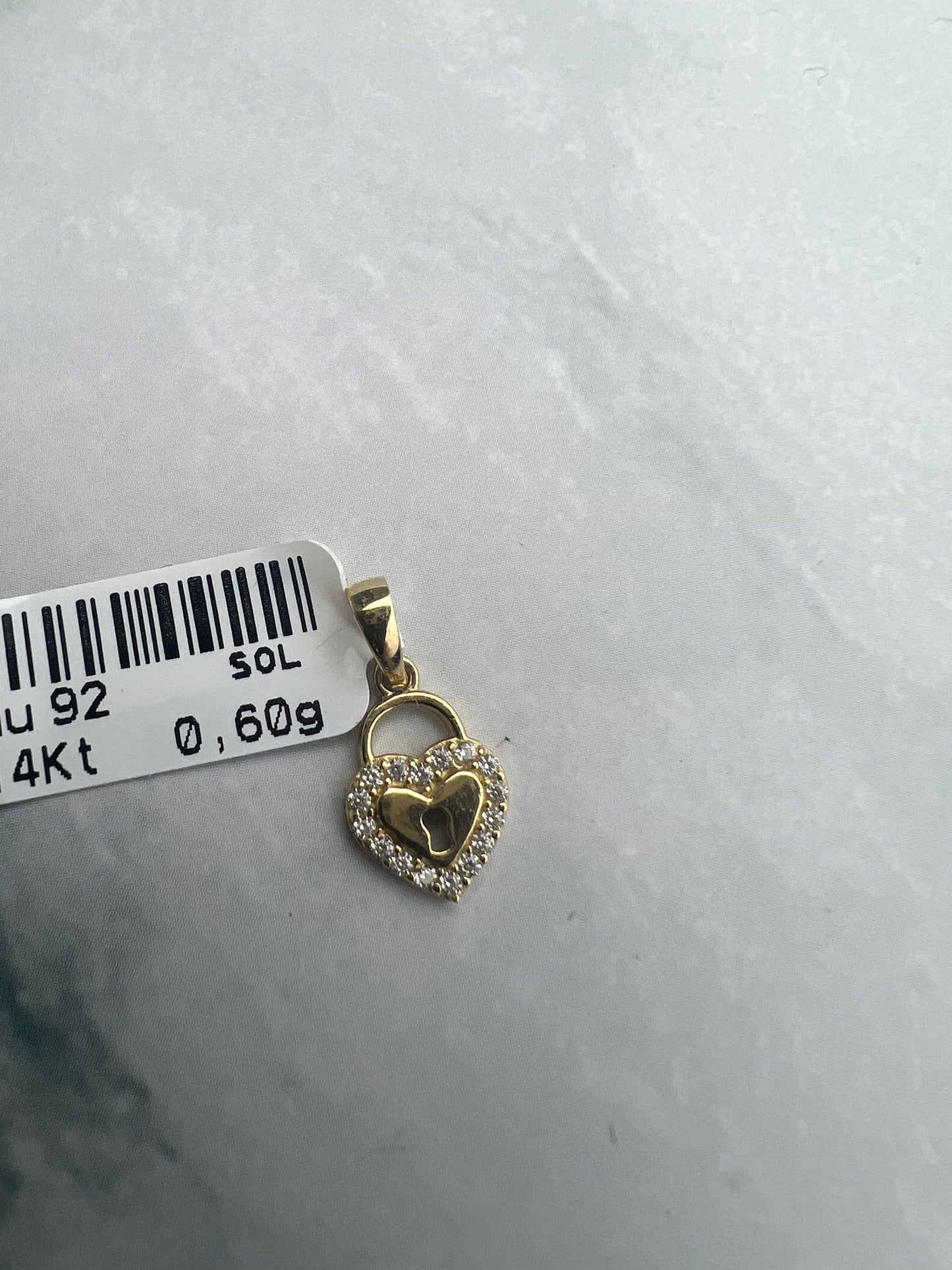 Szív és lakat kombinációjú arany medál cirkónia kövekkel