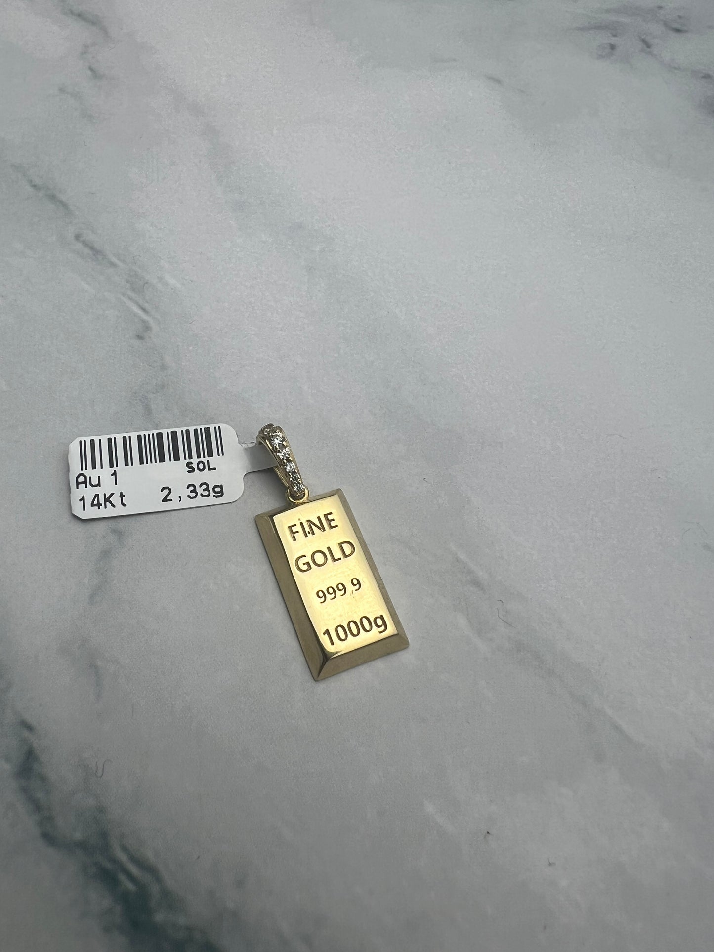 Befektetési aranyat szimbolizáló arany medál