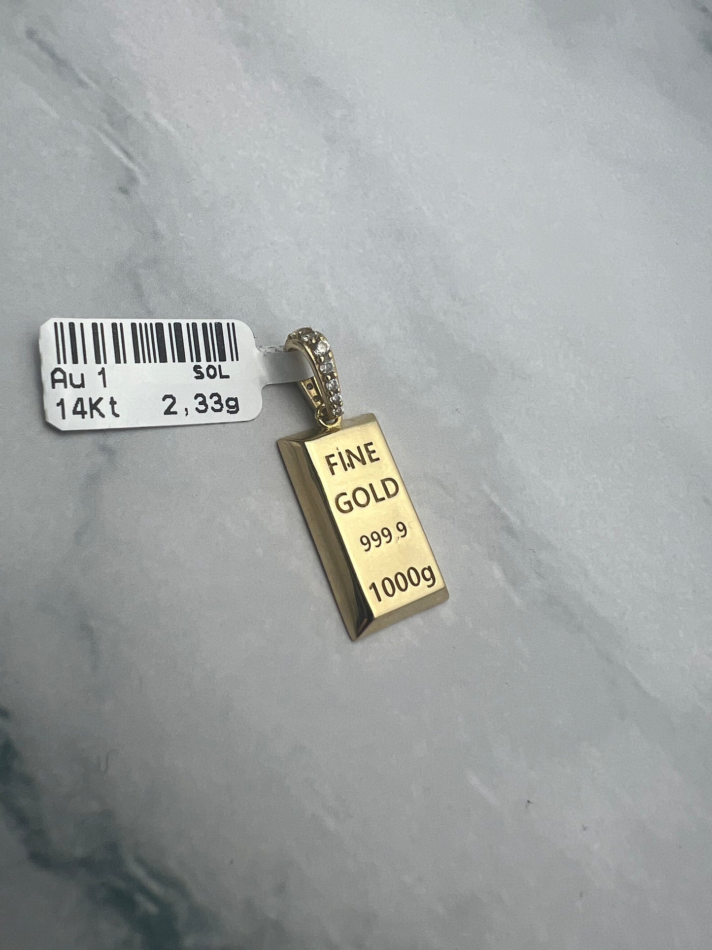 Befektetési aranyat szimbolizáló arany medál