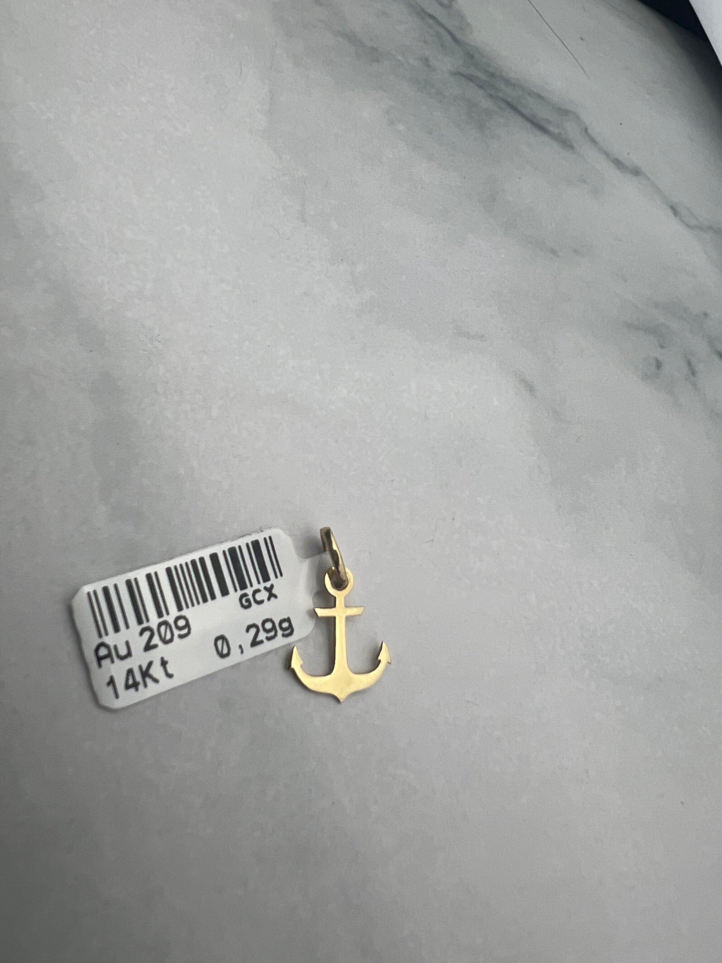 Horgony alakú arany medál