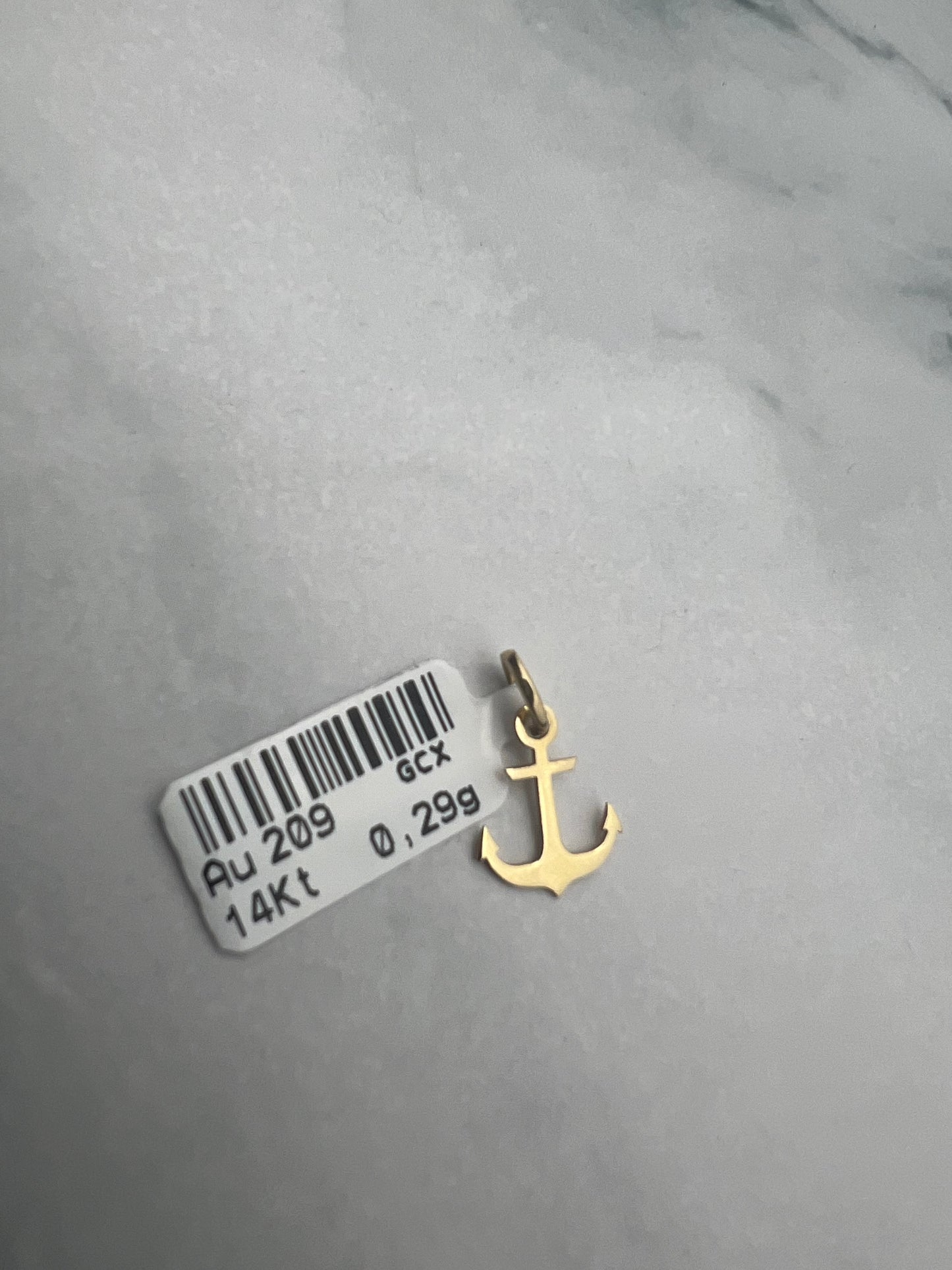 Horgony alakú arany medál