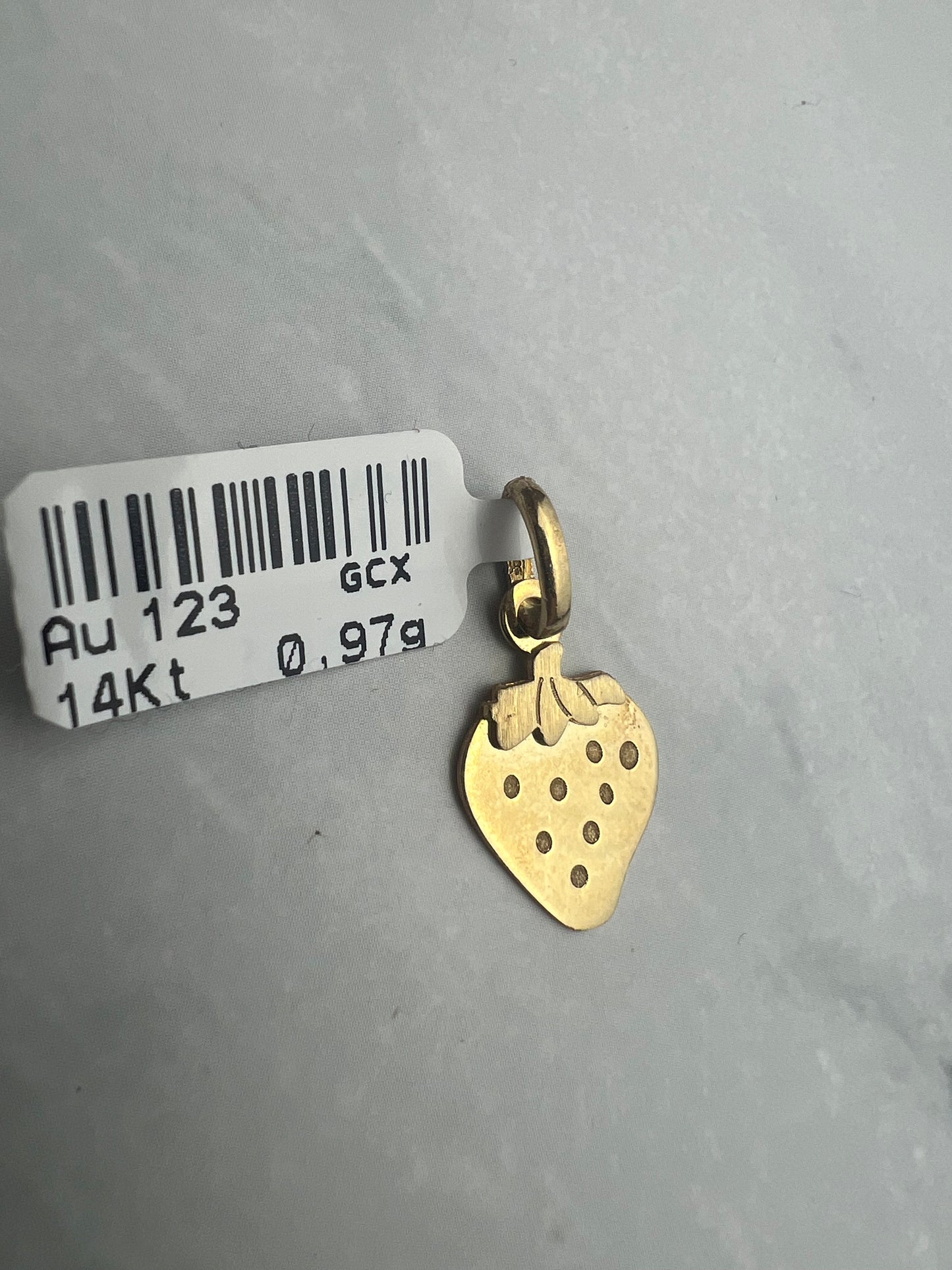 Eper alakú arany medál