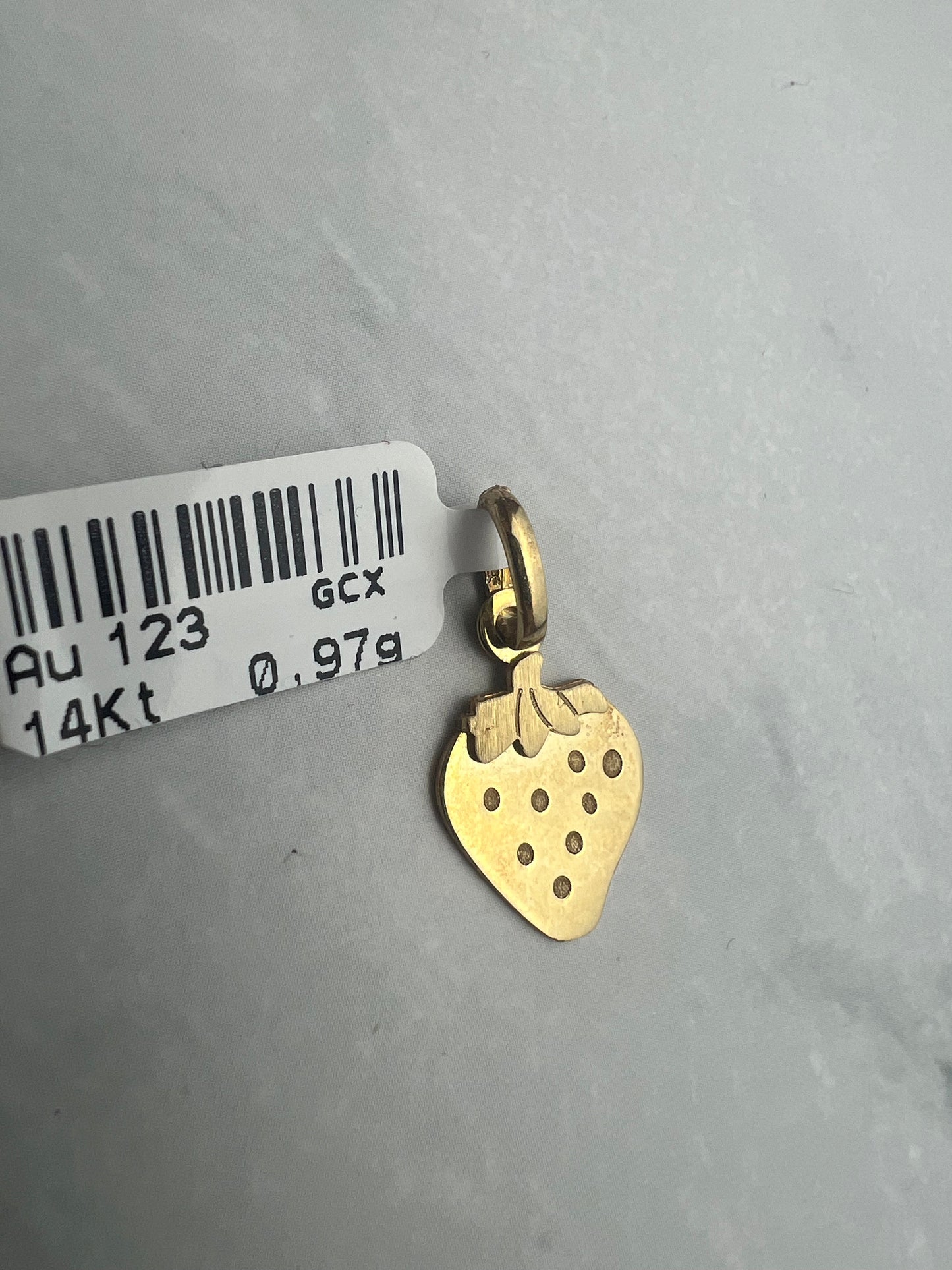 Eper alakú arany medál