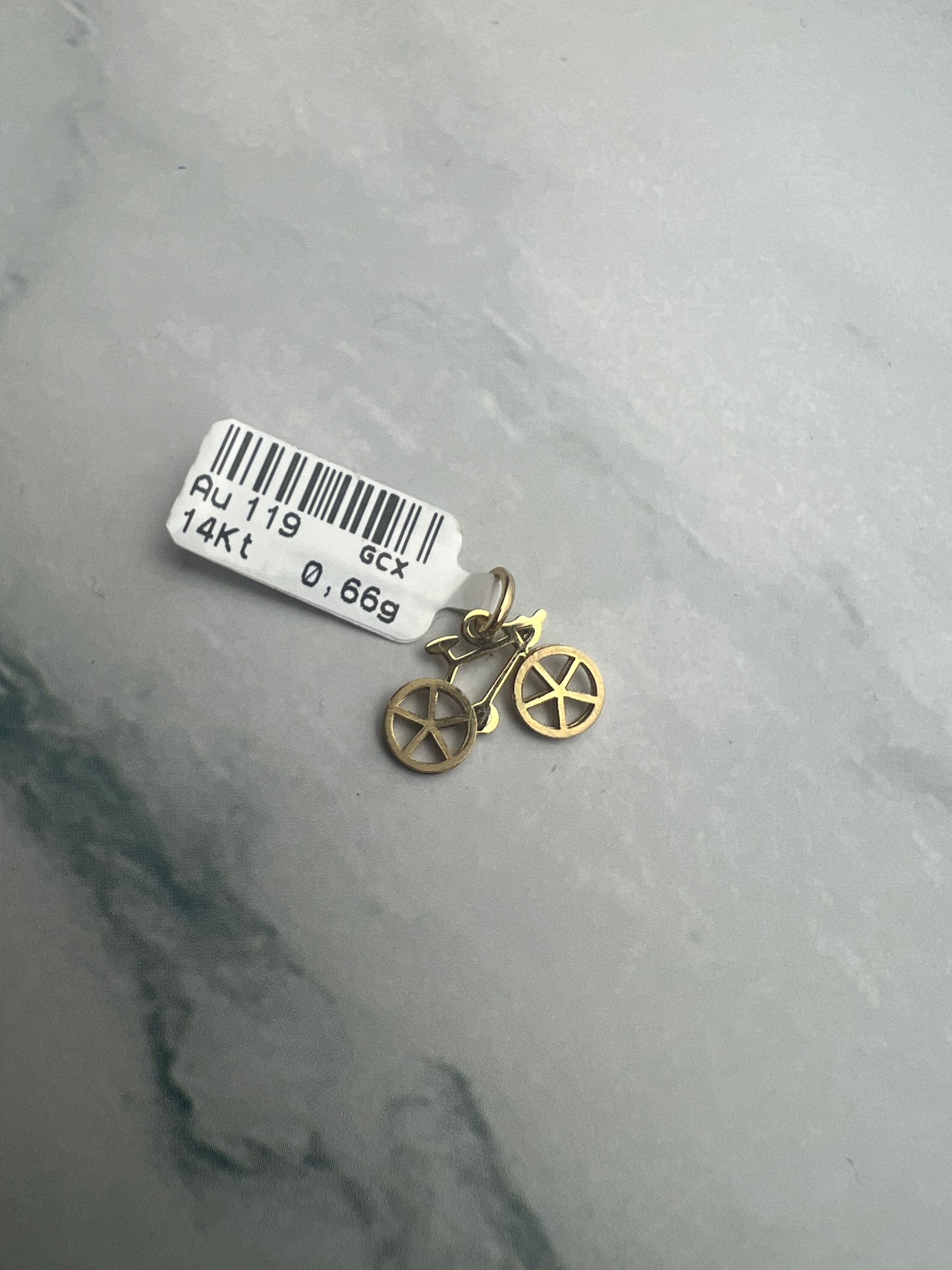 Bicikli alakú arany medál