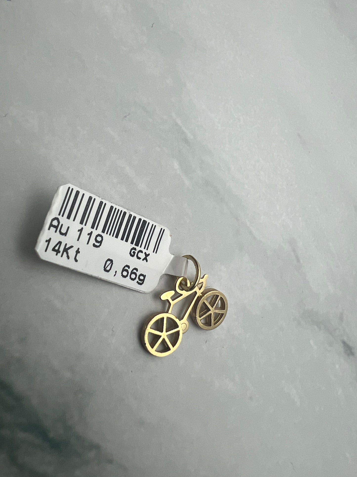 Bicikli alakú arany medál