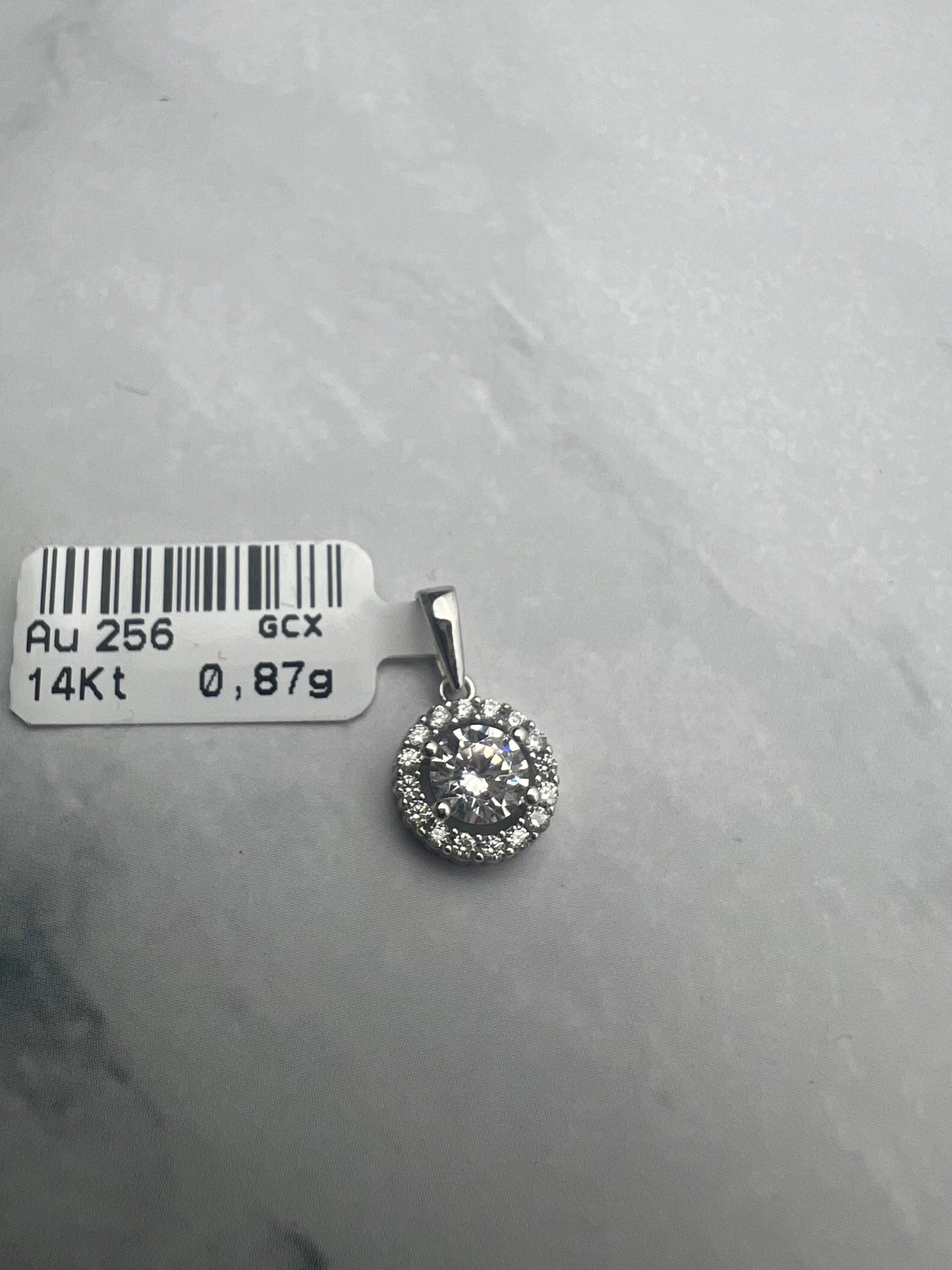 Kerek, cirkónia köves fehérarany medál