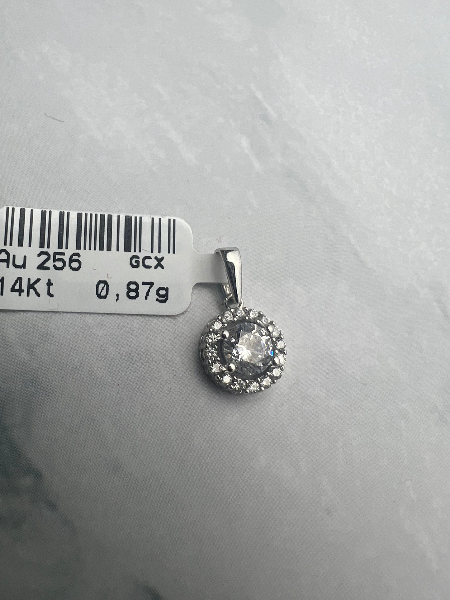 Kerek, cirkónia köves fehérarany medál