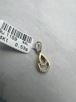 Különleges alakú sárgaarany medál cirkónia kövekkel