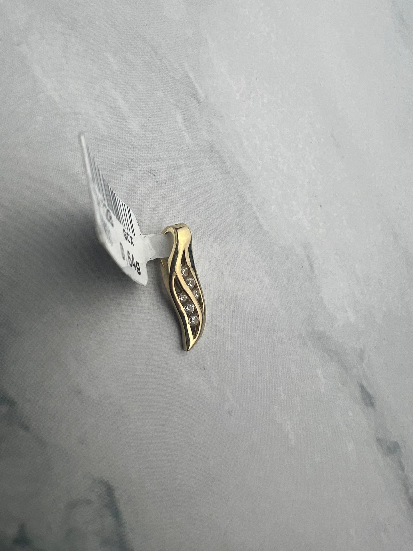 Különleges fazonú sárgaarany medál