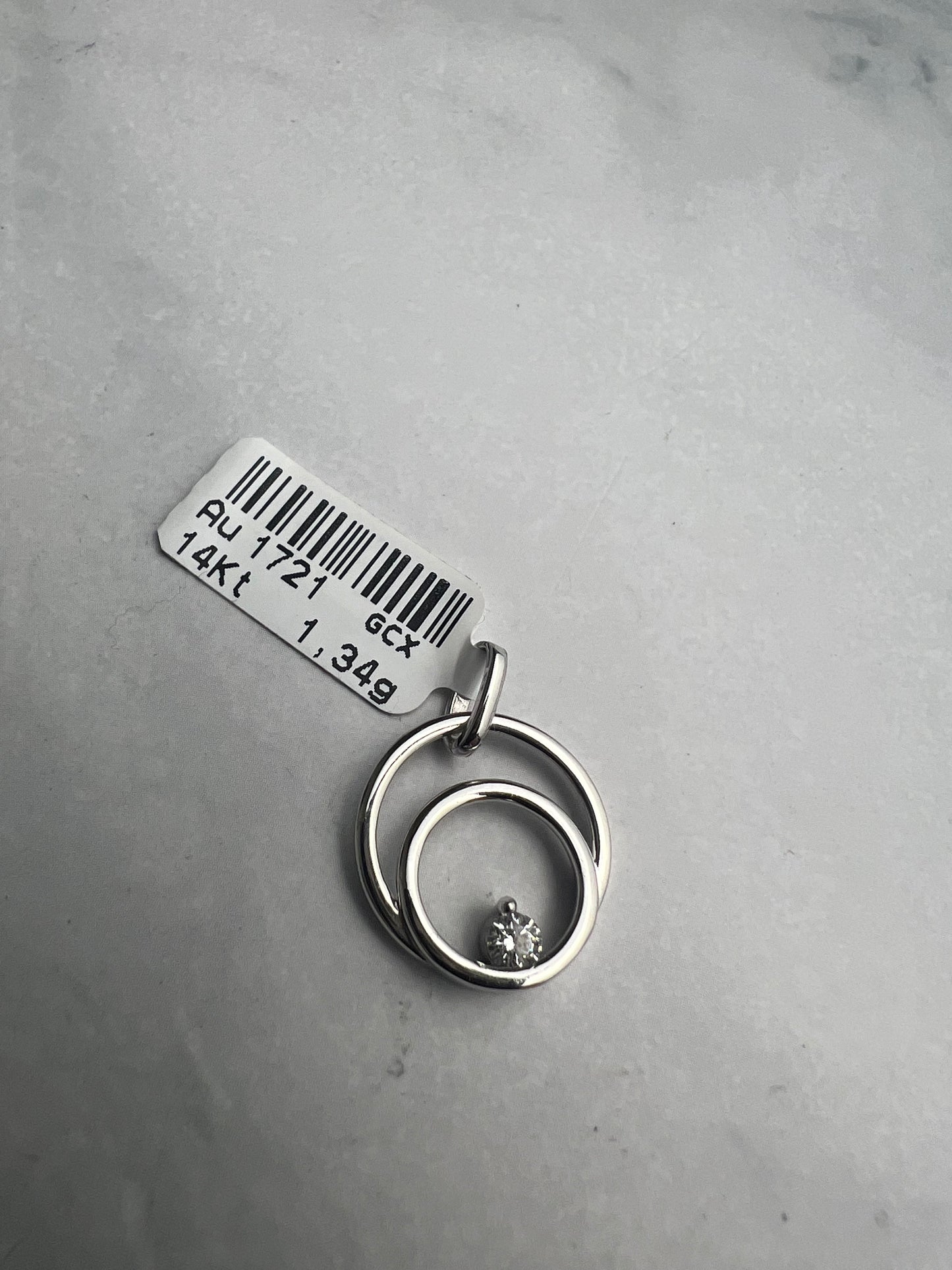 Dupla kör alakú medál, belül cirkónia kővel