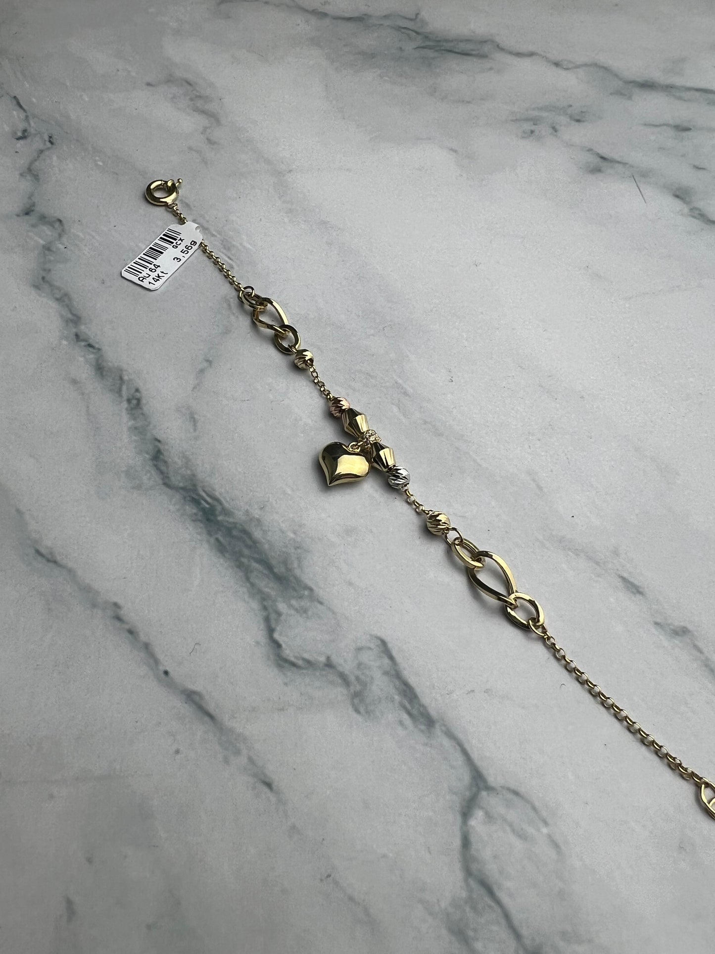 Karlánc tricolor, sárgaarany dominanciával, középen szívvel