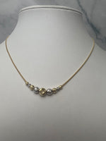 Bicolor metszett gömbös arany nyaklánc