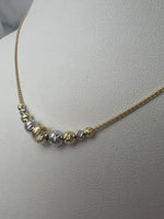 Bicolor metszett gömbös arany nyaklánc