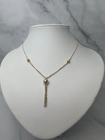 Gömbökkel díszített csüngős arany nyaklánc