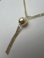 Gömbökkel díszített csüngős arany nyaklánc