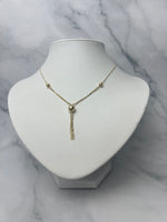 Gömbökkel díszített csüngős arany nyaklánc