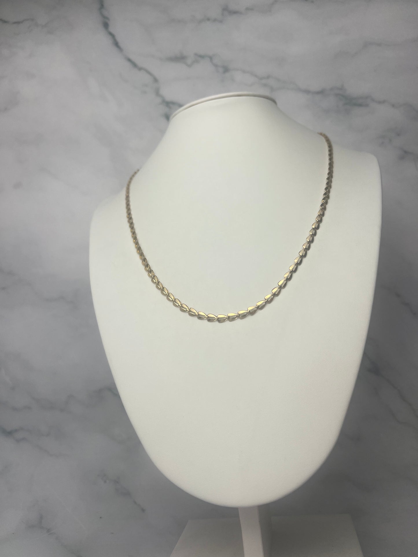 Háromszög szemes fűzött fazonú arany nyaklánc