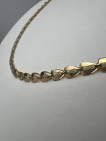 Háromszög szemes fűzött fazonú arany nyaklánc