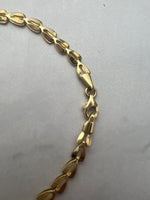 Háromszög szemes fűzött fazonú arany karlánc